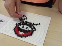 Bild vergr&ouml;&szlig;ern: Sommerferienprogramm - Perle f&uuml;r Perle zu Mario & Co.